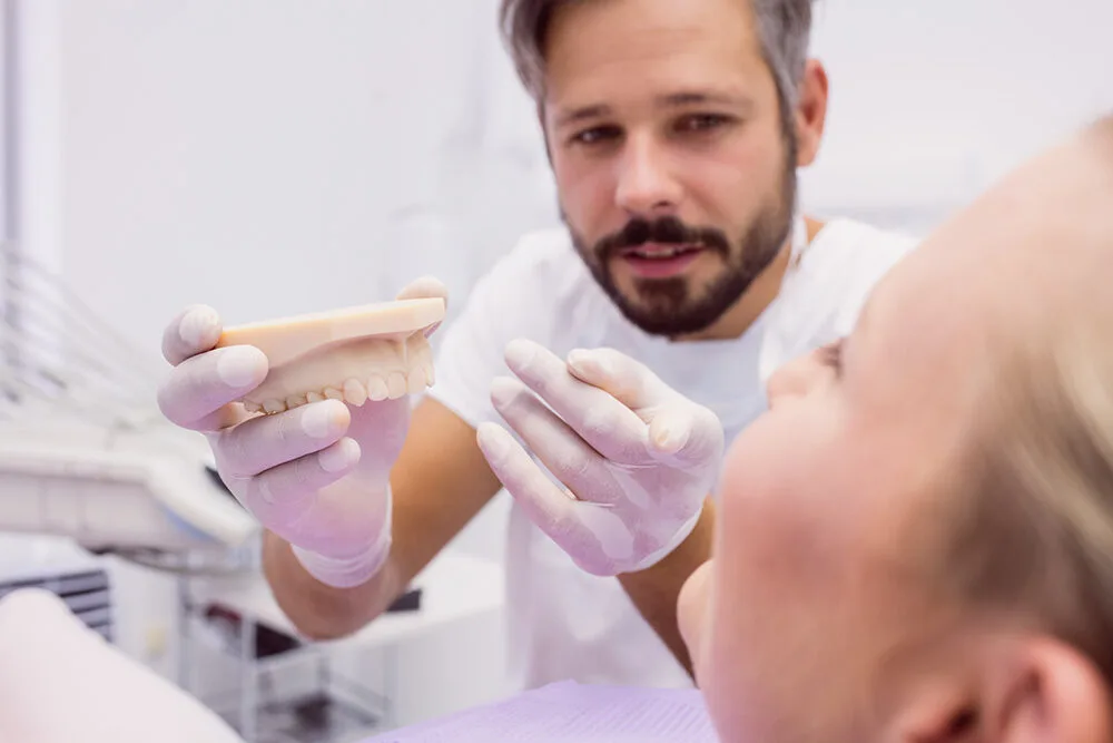 Pacient cu dantură fixă finalizată la Clinica Dent Park București